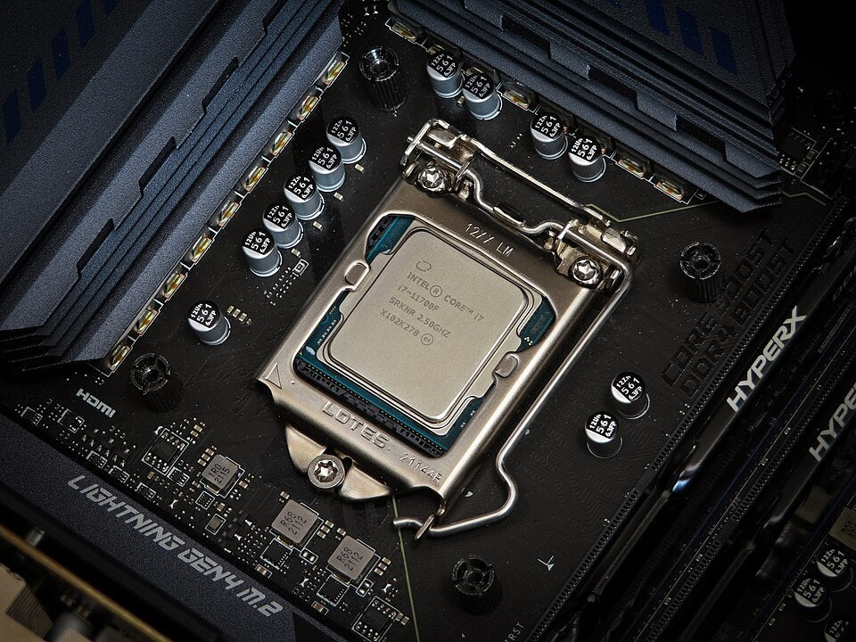 Real Intel Core i7-11700F CPU installed on MSI Z590 motherboard, genuine reference photo