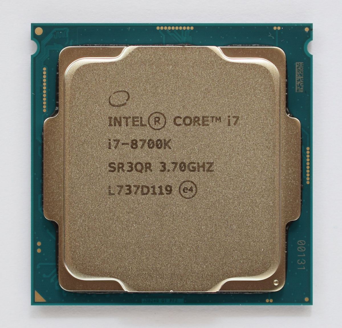 Genuine Intel Core i7-8700K SR3QR processor, photo by ElooKoN, CC BY-SA 4.0 Wikimedia Commons; reference not store inventory